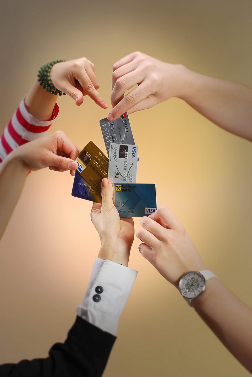 hands with business cards